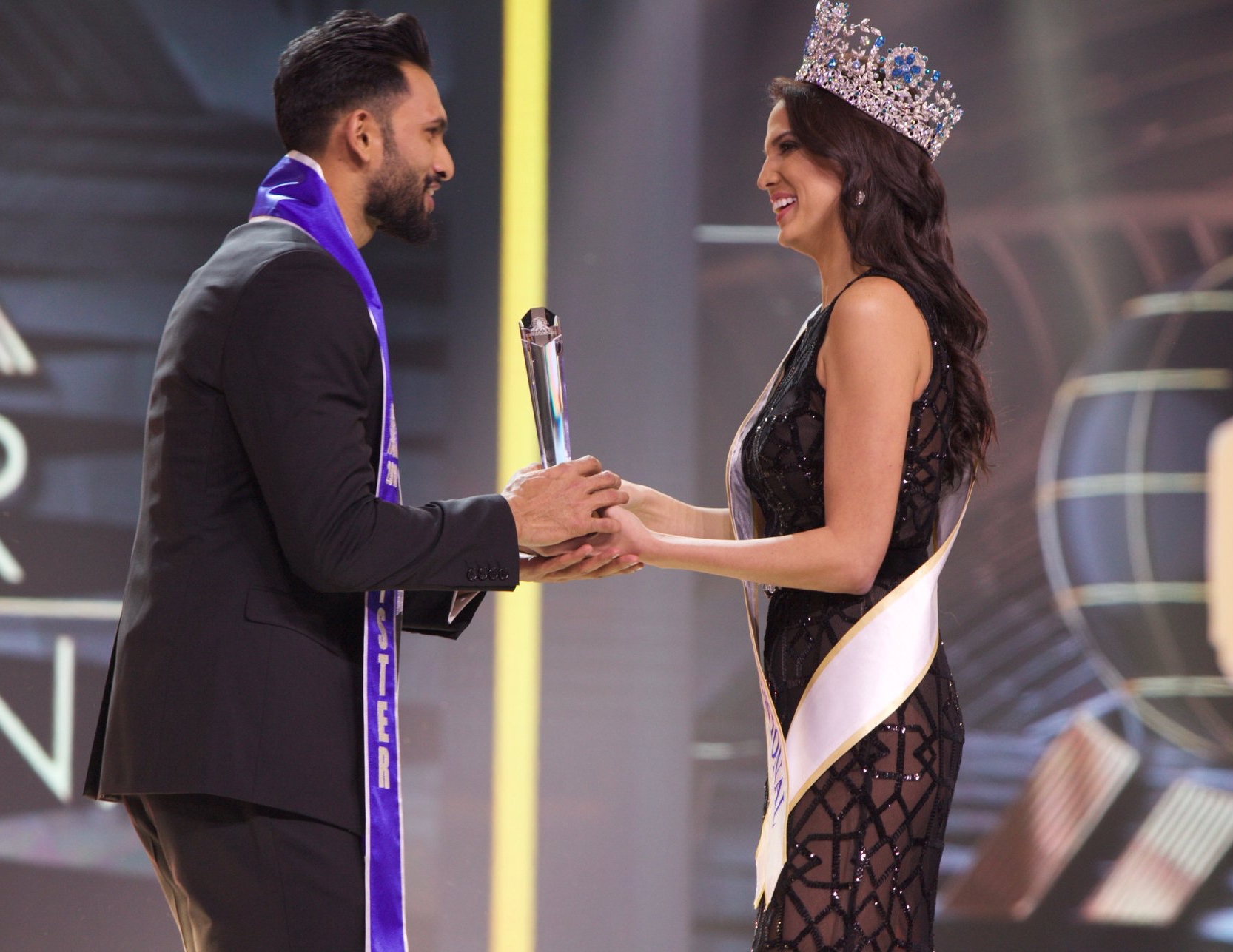 Mister Supranational 2018 India Prathamesh Maulingkar winning the contest with Puerto Rico Valeria Vazquez giving the trophy